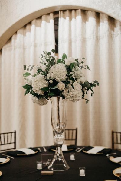 Reception arrangements by Exotica the signature of flowers- at Madera Estates
A show stopping large white arrangement of hydrangea, roses, stock, and mixed greenery.
Photography- Angela Nobles: Photographer