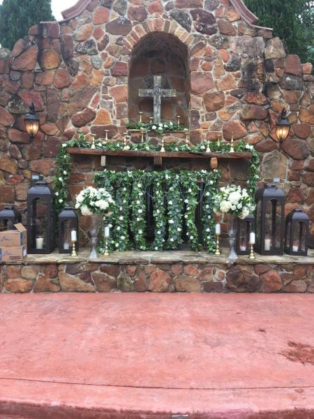 Outdoor Ceremony Flower by Exotica the signature of flowers- at Madera Estates
Green mixed garland accented with white flowers, crystals, and gold candle-stands and candles. 
Photography- Angela Nobles: Photographer