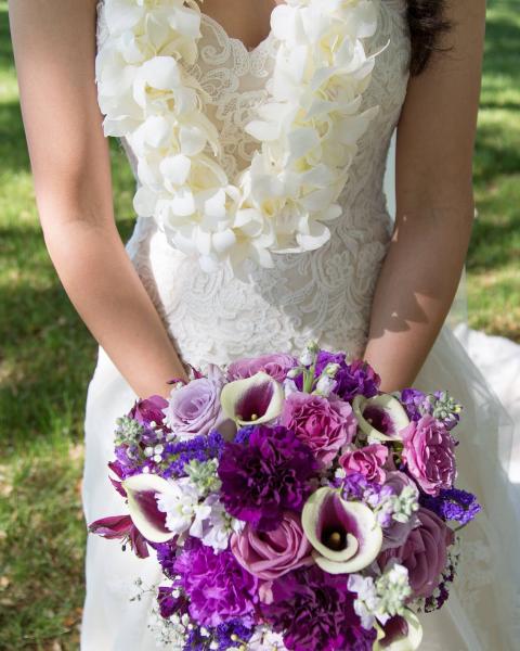 Lavender and Purple Brides Bouquet including roses, stock carnations, calla lillys, babys breath