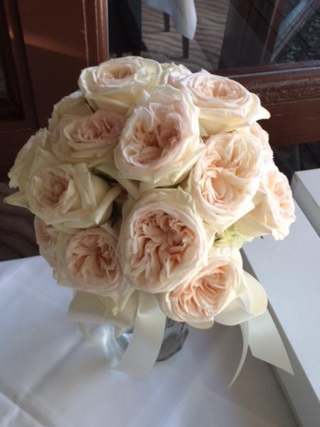 Elegant hand-tied garden rose bouquet with ivory satin ribbon