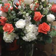 Coral and White Flower Guest Book Arrangement