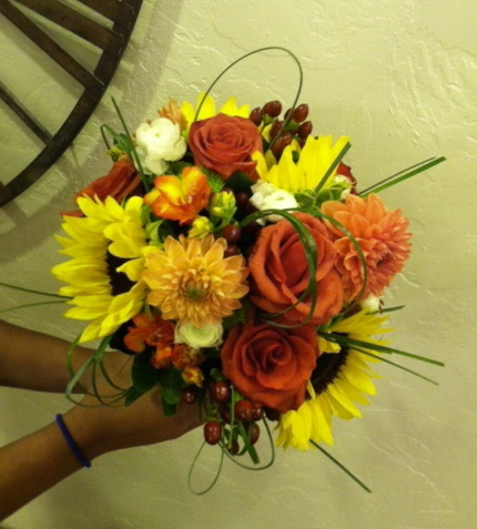 Sunflowers, dahlia's, roses,freesia, ranunculus, brown hypericum and greenery